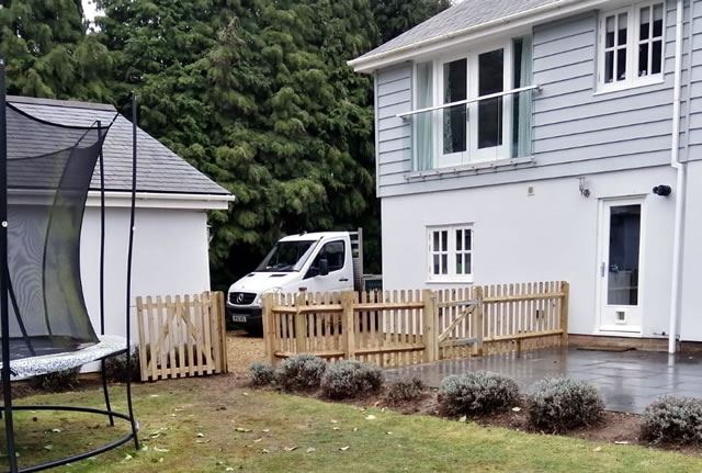 Picket fence boundary to house and garden